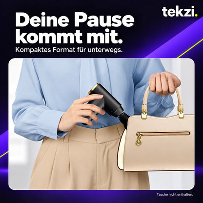 Mini-Massagepistole am Taschenrand, Motiv für unterwegs; Tasche nicht enthalten